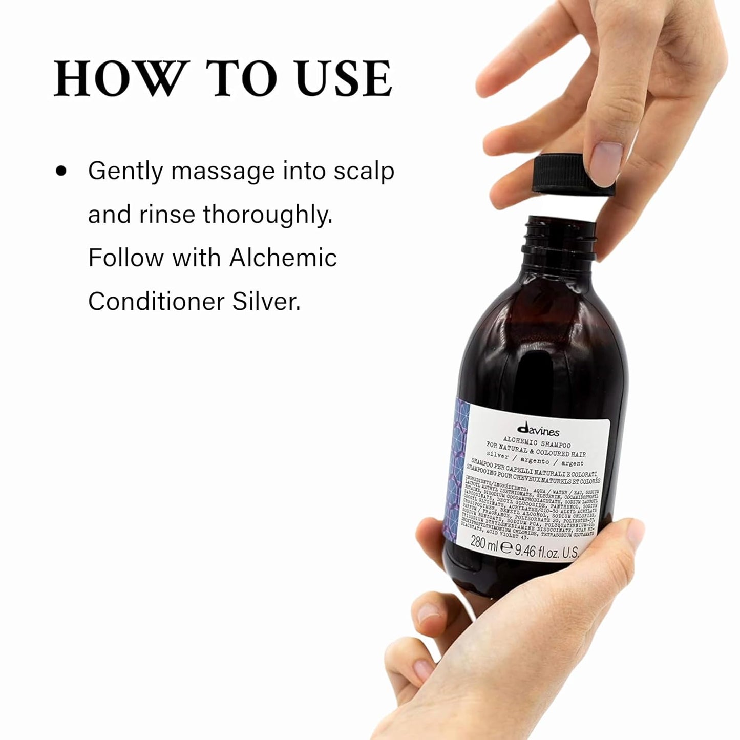 Davines Alchemic Shampoo Silver. Bottle of Davines shampoo with text on how to use it, held by a hand.