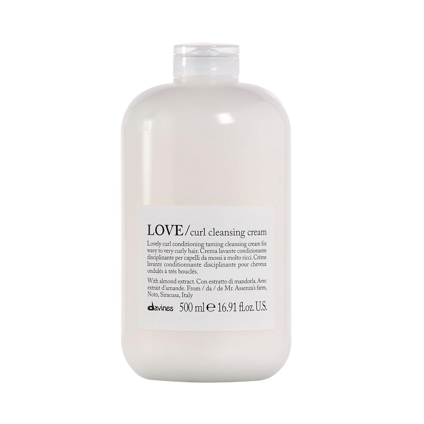 Bottle of Davines LOVE/curl cleansing cream on a white background