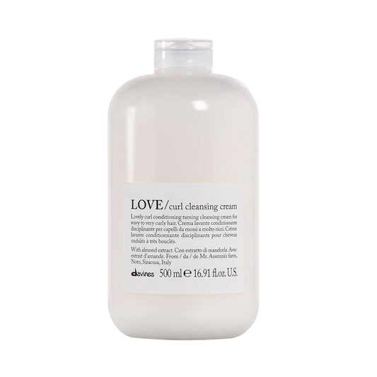 Bottle of Davines LOVE/curl cleansing cream on a white background