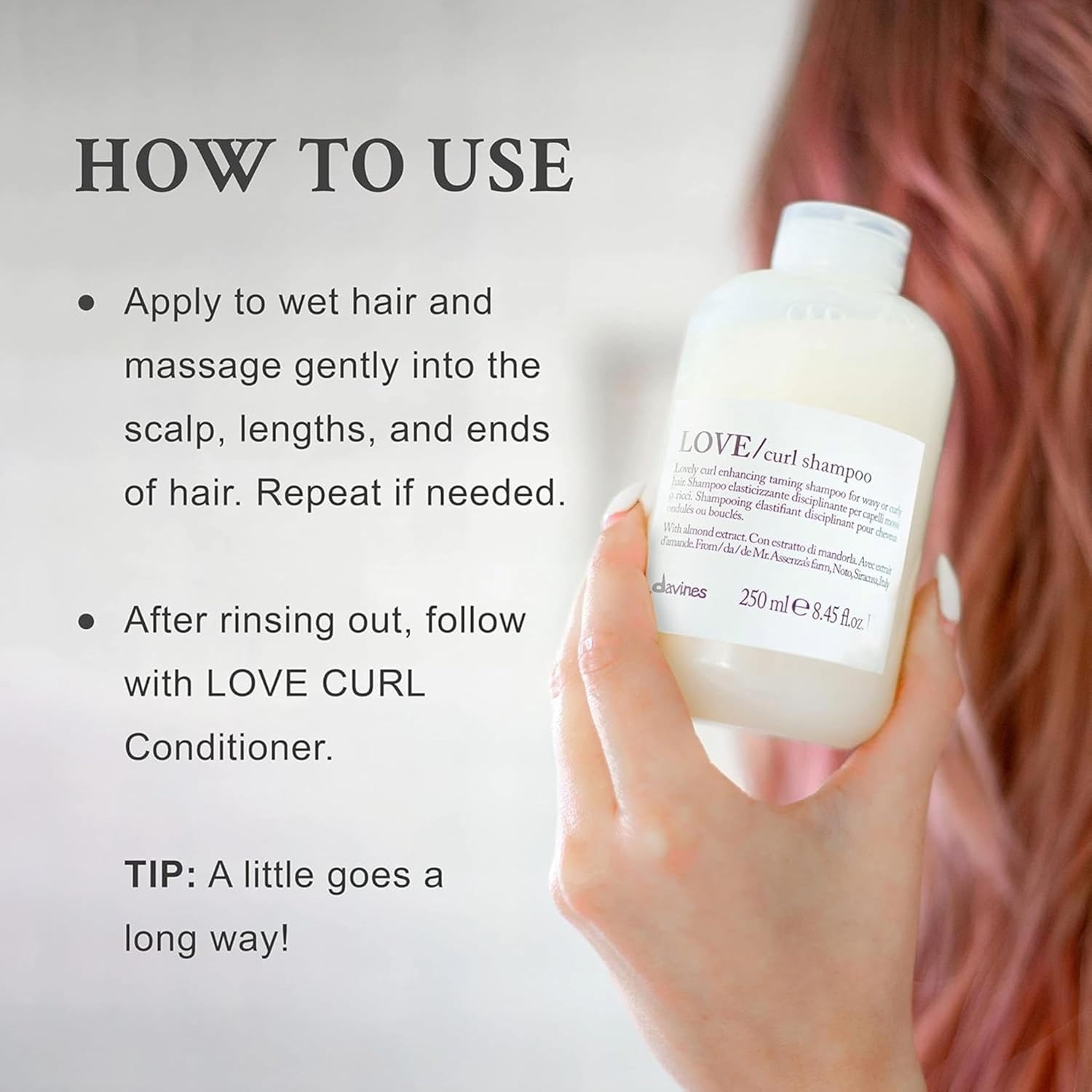 Davines LOVE Curl Shampoo How To Use. Hand holding a bottle of Davines shampoo with usage instructions on a gray background