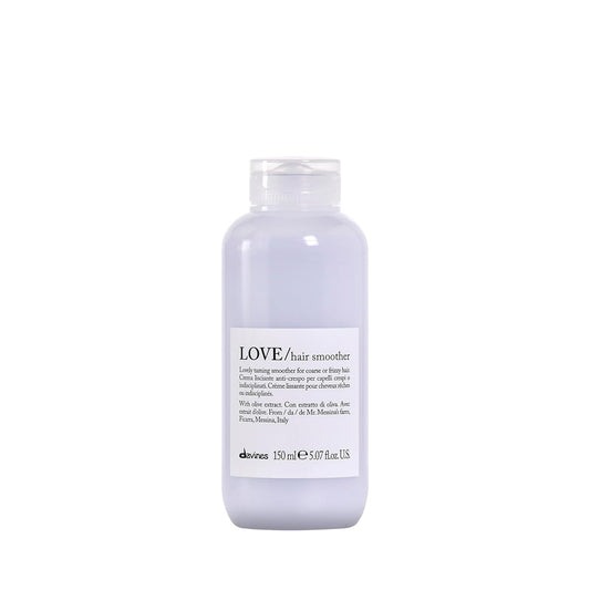 Bottle of Davines LOVE hair smoother on a white background