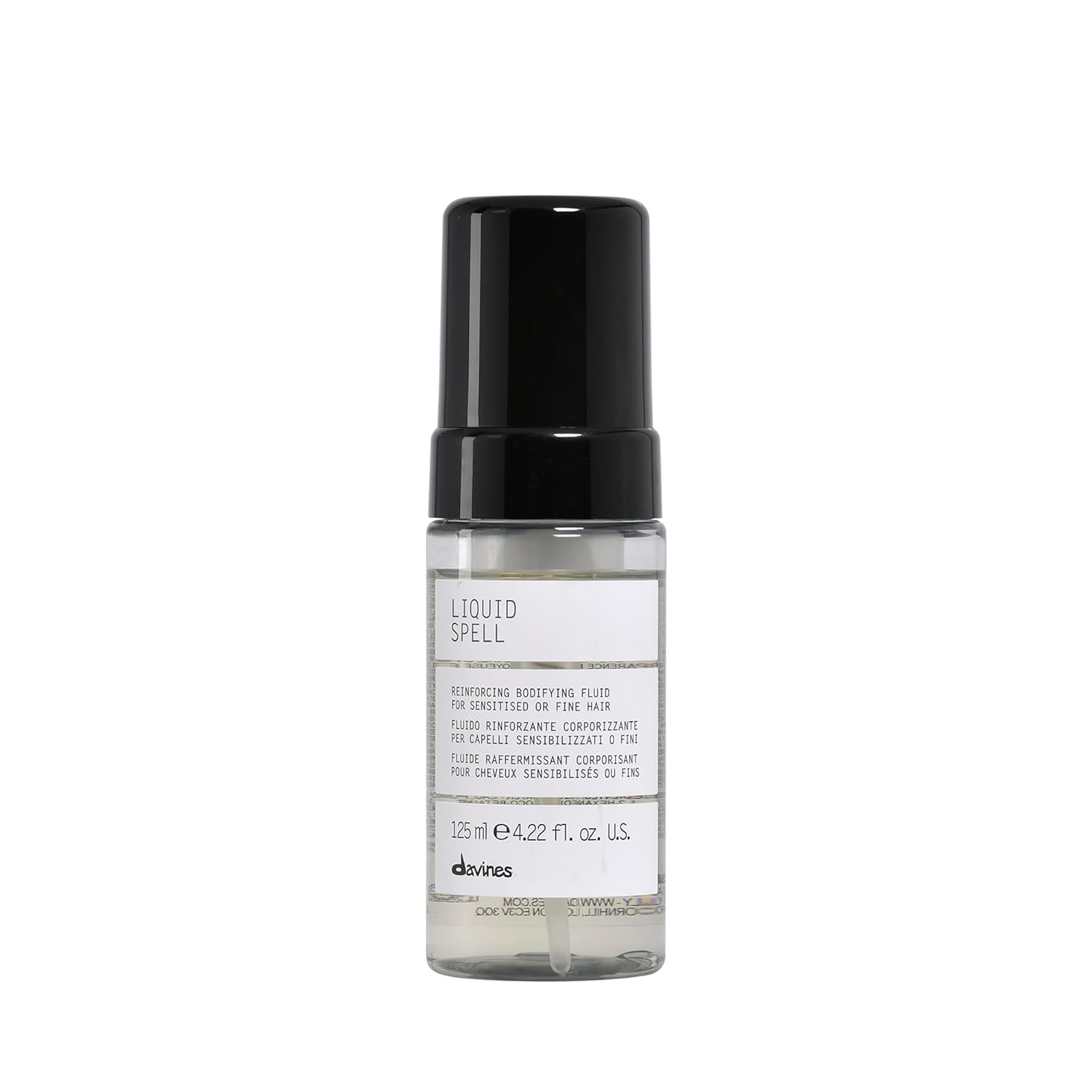 Bottle of davines Liquid Spell on a white background