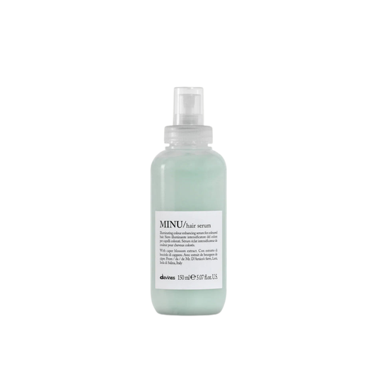 Hair serum bottle labeled 'MINU' on a white background