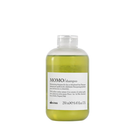 Shampoo bottle labeled 'MOMO/shampoo' by davines on a white background