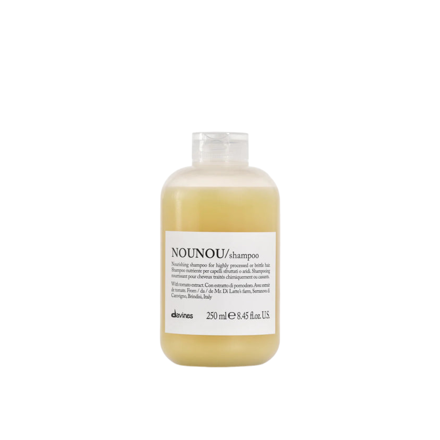 Bottle of NOUNOU shampoo on a white background