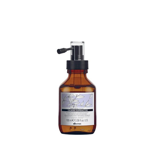 Davines Naturaltech Calming Superactive. Brown bottle with a label on a white background