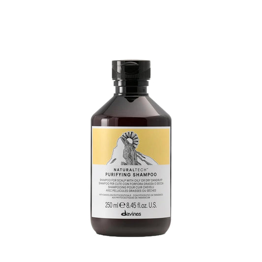 Bottle of Davines Naturaltech Purifying Shampoo with a black cap on a white background