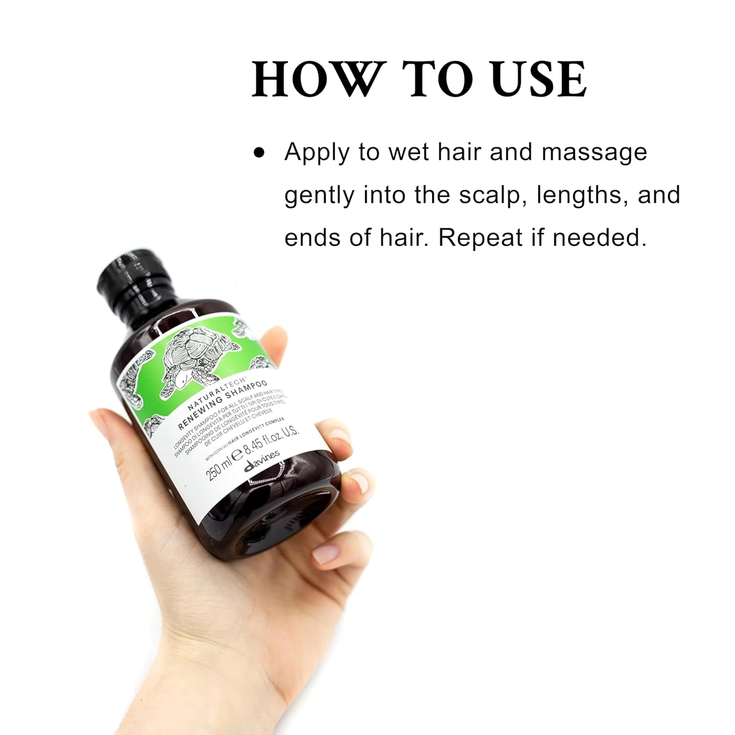 Davines  Naturaltech Renewing Shampoo. Hand holding a bottle of hair care product with usage instructions on a white background