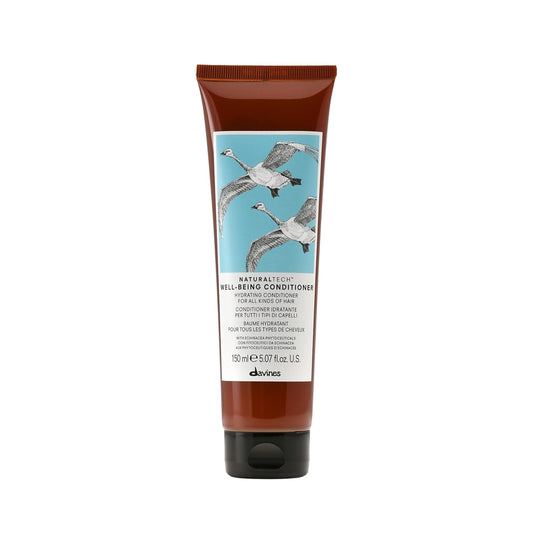 Tube of devines Natural Tech Well-Being Conditioner on a white background