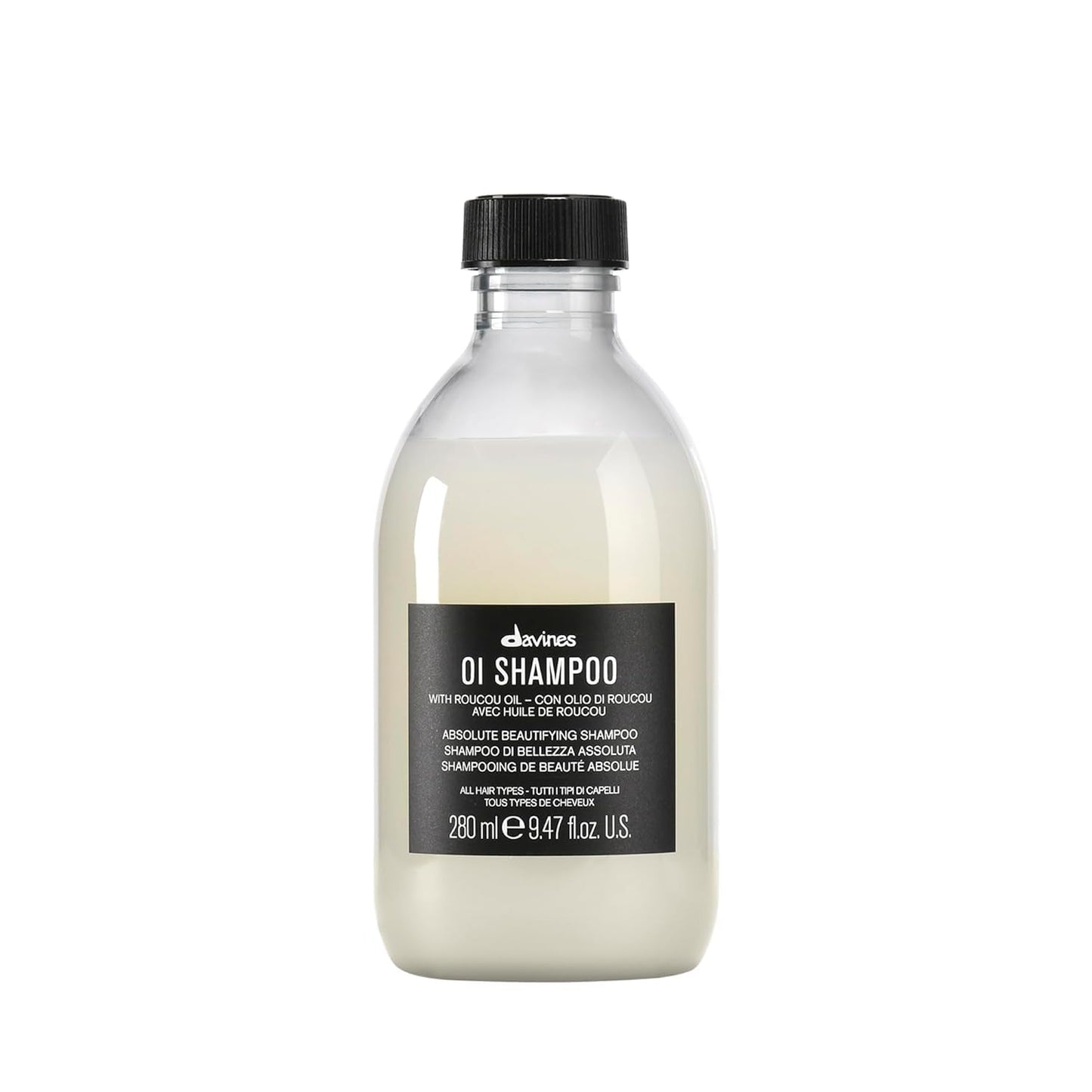 Bottle of Davines OI Shampoo on a white background