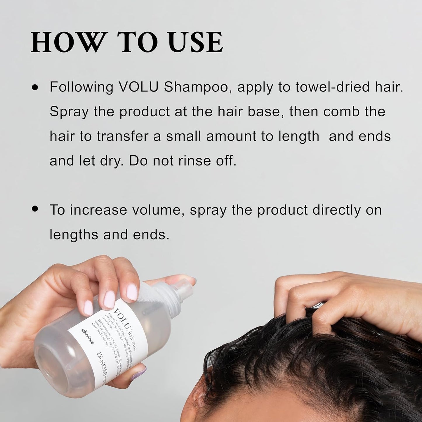 Davines VOLU Hair Mist. Instructions for using a hair product with a bottle and hands applying it to hair on a gray background.