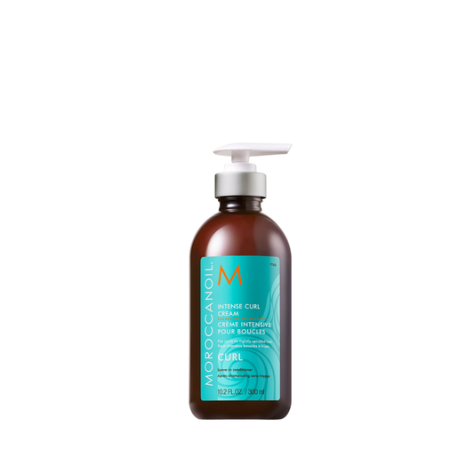 Moroccan Oil Intense Curl Cream. Moroccanoil bottle with pump on a white background