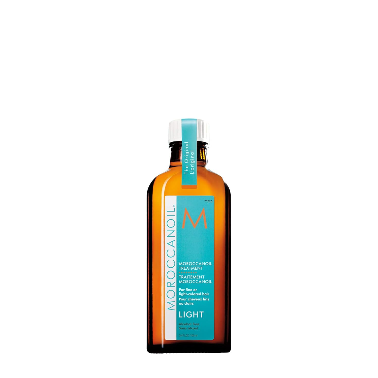 A Bottle of Moroccan Oil Treatment LIGHT placed against a plain white bacground.